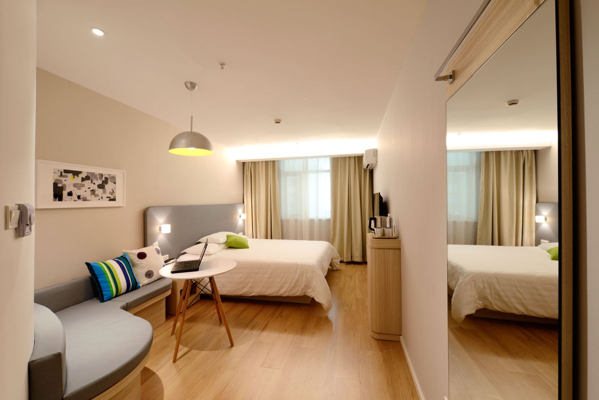 Modern private condominium with glass facade, pool deck, and MCST-managed shared facilities
